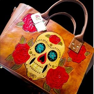 Hand crafted leather vegetable paint tote bag